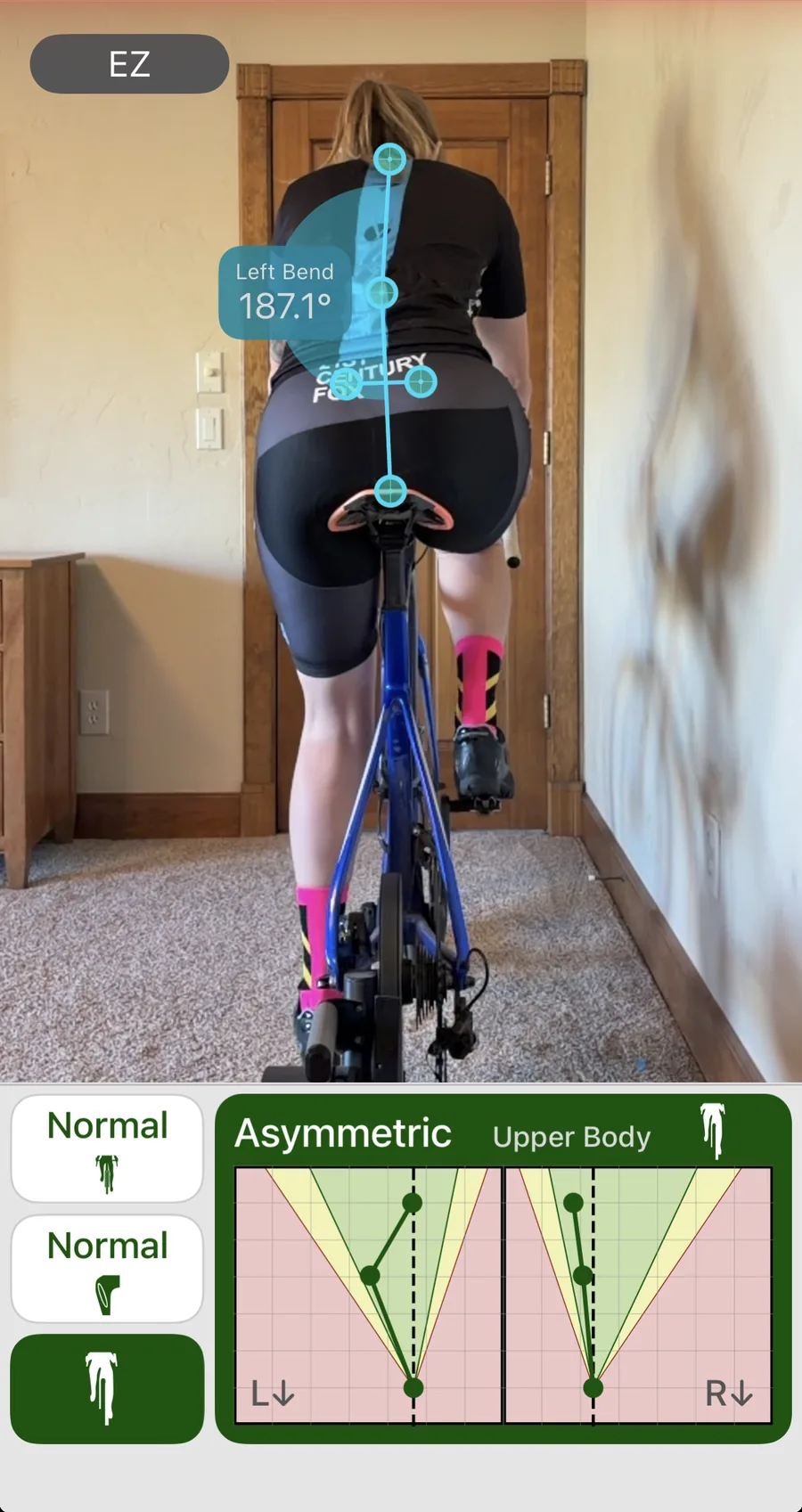 Bike Fast Fit Pro rear-view analysis of a rider from behind, with the bend measured in degrees along the tracked spine and the Upper Body Balance reading charted left against right below